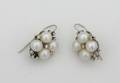 A Pair of Ladys 14 Karat White Gold Cultured Pearl and Diamond Earrings