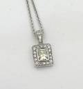 A Ladys 14 Karat White Gold and Diamond Pendant