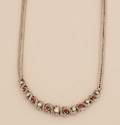 A Ladys 18 Karat White Gold Ruby and Diamond Necklace