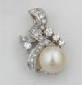 A Ladys 14 Karat White Gold Diamond and Cultured Pearl Pendant