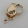 A 14 Karat Yellow Gold 10 X Triplet Loupe