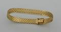 A Ladys 18 Karat Yellow Gold Mesh Style Bracelet