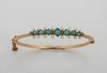 A Ladys Yellow Gold Turquoise and Cultured Pearl Hinged Bangle Bracelet