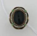 A Ladys 14 Karat White and Yellow Gold Black and Green Enamel Black Onyx and Seed Pearl Filigree Style Ring