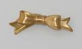 A Ladys 18 Karat Yellow Gold Bow Pin Angela Cummings