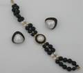 A Ladys Yellow Gold Black Onyx Mabe Pearl and Cultured Pearl Bracelet and Earring Set
