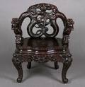 A Chinese Carved Hardwood Armchair