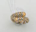A Ladys 18 Karat Yellow Gold and Stainless Steel Ring Bulgari