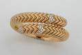 A Ladys 18 Karat Yellow Gold and Diamond Bracelet Bulgari