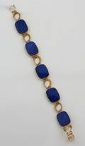 A Ladys 14 Karat Yellow Gold and Lapis Lazuli Bracelet