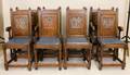 A Group of Eight Gothic Revival Oak Chairs