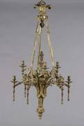 A Gilt Metal Nine Light Louis XVI Style Chandelier