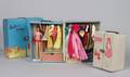 A Group of Barbies and Cases