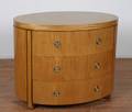 A Charles Pfister Oval Commode for Baker