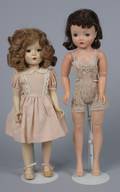 A Group of Two Hard Plastic Dolls