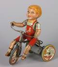 A Unique Art Kiddy Cyclist Vintage Windup Tin Toy