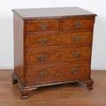 A Georgian Style Burl Walnut and Inlaid Chest of Drawers