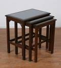 A Nest of Three Mahogany Tables