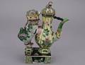 259 FAMILLE VERTE BISCUIT PORCELAIN EWER AND COVER