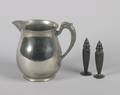 A Pewter Water Pitcher