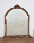 A Carved Rococo Style Mirror
