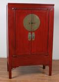 A Chinese Red Lacquer Two Door Cabinet