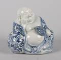 A Chinese Blue and White Porcelain Figure of a Budai