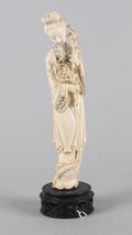 A Chinese Carved Ivory Figure of a Meiren