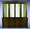A Continental Neoclassical Style Mahogany China Cabinet