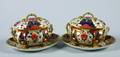 A Pair of Royal Crown Derby Sauce Tureens Covers and Stands