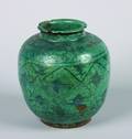 A Persian Turquoise Glazed Ceramic Vase