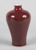 A Chinese Sang de Boeuf Glazed Porcelain Meiping Jar