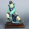 A Chinese Turquoise and Blue Glazed Pottery Figural Ridge Tile