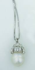 A Ladys 14 Karat White Gold South Seas Cultured Pearl and Diamond Pendant