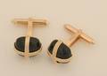 A Pair of Gentlemans 14 Karat Yellow Gold and Black Onyx Cufflinks