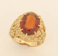 A Ladys 18 Karat Yellow Gold and Citrine Ring
