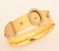A Ladys Late Victorian 14 Karat Yellow Gold Hinged Bangle Bracelet