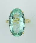 A Ladys 14 Karat Yellow Gold and Aquamarine Ring