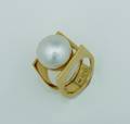 A Ladys 18 Karat Yellow Gold and South Seas Cultured Pearl Ring