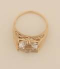 A Ladys 14 Karat Yellow Gold and White Beryl Ring