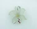 A Ladys Carved and Frosted Crystal White Gold Diamond and Ruby Brooch