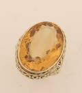 A Ladys 14 Karat Yellow Gold and Citrine Ring
