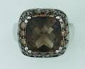 A Ladys 14 Karat White Gold Smoky Quartz and Fancy Brown Diamond Ring