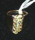 A Ladys 14 Karat Yellow Gold and Peridot Ring
