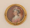 A Ladys Yellow Gold Crystal Covered Painted Portrait Miniature Brooch