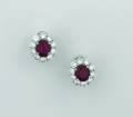 A Pair of Ladys 18 Karat White Gold Ruby and Diamond Earrings Fred Leighton