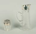 An American Silver Topped Cut Glass Pitcher and an American Silver Topped Cut Glass Jar