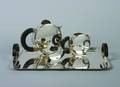 A French Art Deco Silver Plate Four Piece Tea Service Christofle