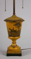 A Gilt Stenciled Tole Lamp