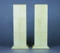 A Pair of Parchment Covered Pedestals